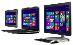 Tablet next to a laptop next to an all-in-one